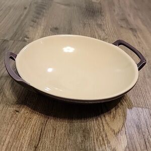 Le Creuset Cassis Wok Dish. Collectable discontinued color. Dishwasher safe.